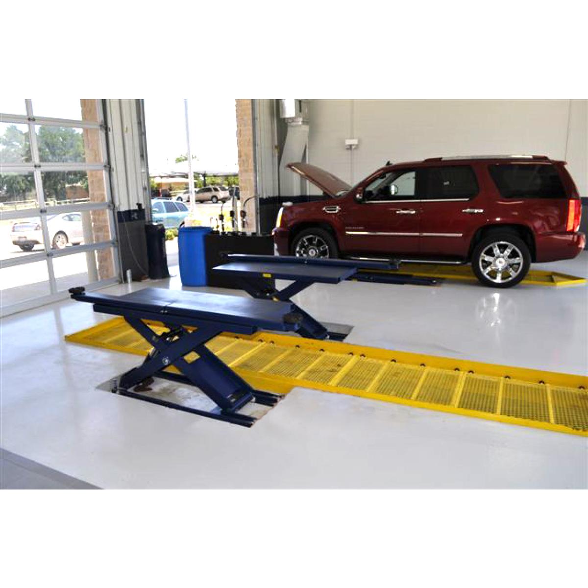 Quick Lube 9000 » Plataformas elevadoras para talleres de automóviles